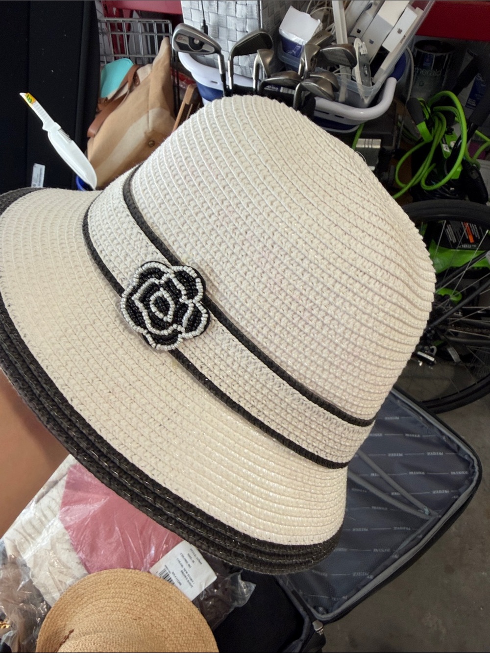 Cream Straw Cloche Hat with Black Trim and Flower Accent
